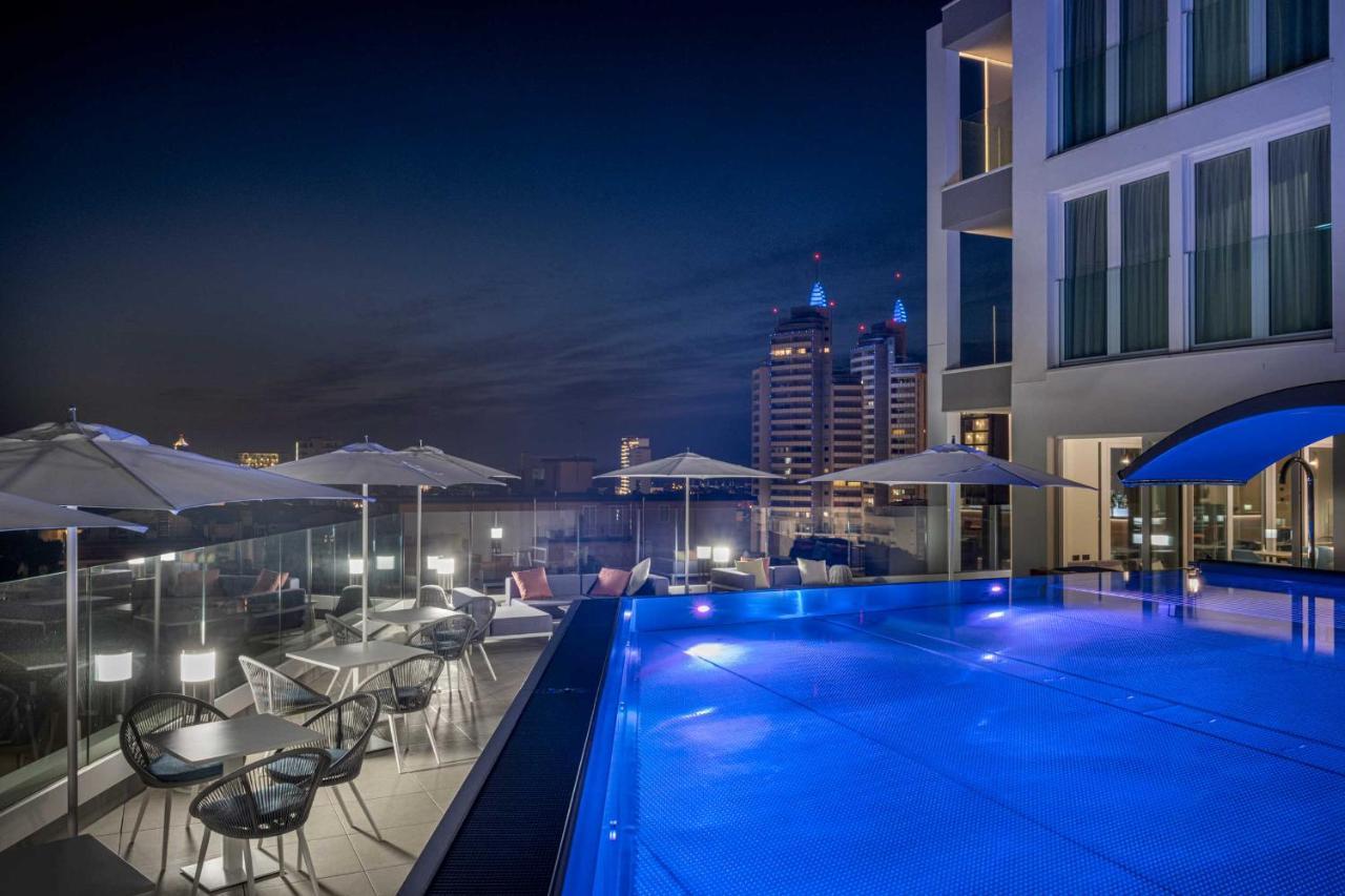 J44 Lifestyle Hotel Lido di Jesolo Esterno foto The swimming pool at the hotel